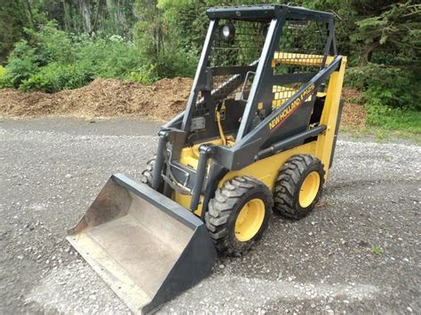 new holland ls125 skid steer specs|cat ls125 oil capacity.